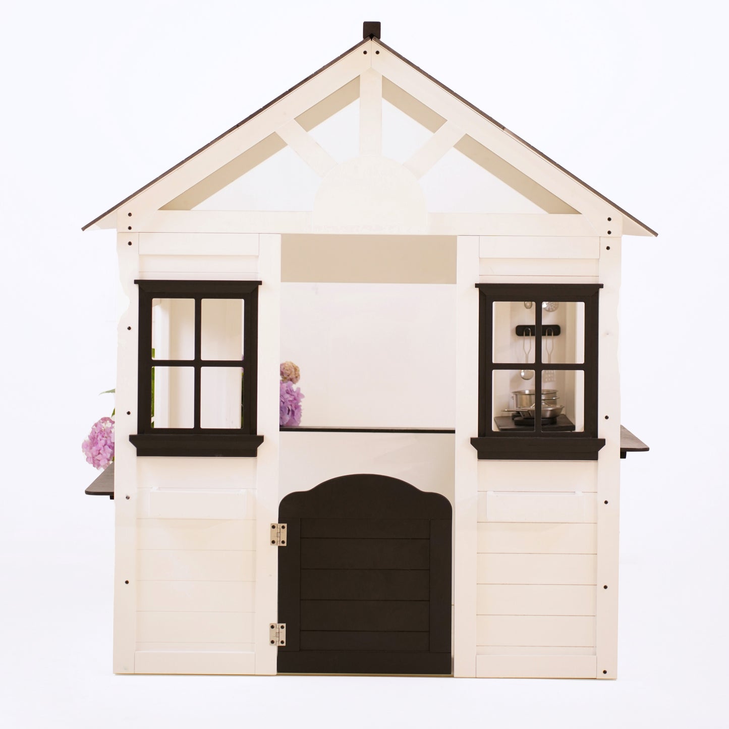 Front view of a modern white wooden playhouse with black windows, black roof, and a black half-door entrance
