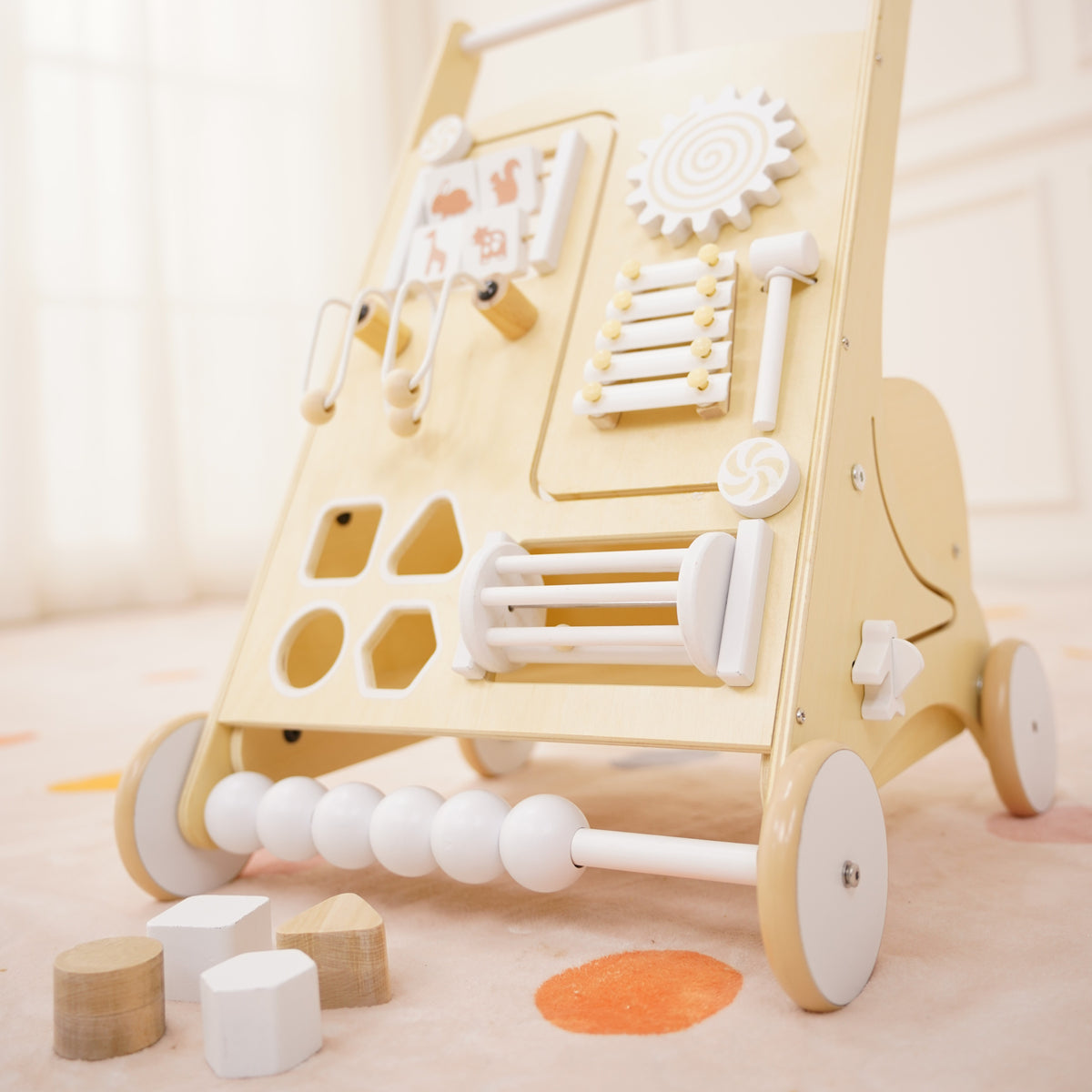 Baby playing with the Avenlur activity walker sensory panel
