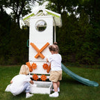 Children pouring water into the Aloe playhouse sensory play basin and wheel system