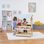 Kids playing shopkeeper at the Avenlur Cypress market stand