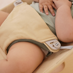 Avenlur Fir foldable baby bouncer folded flat for storage and travel