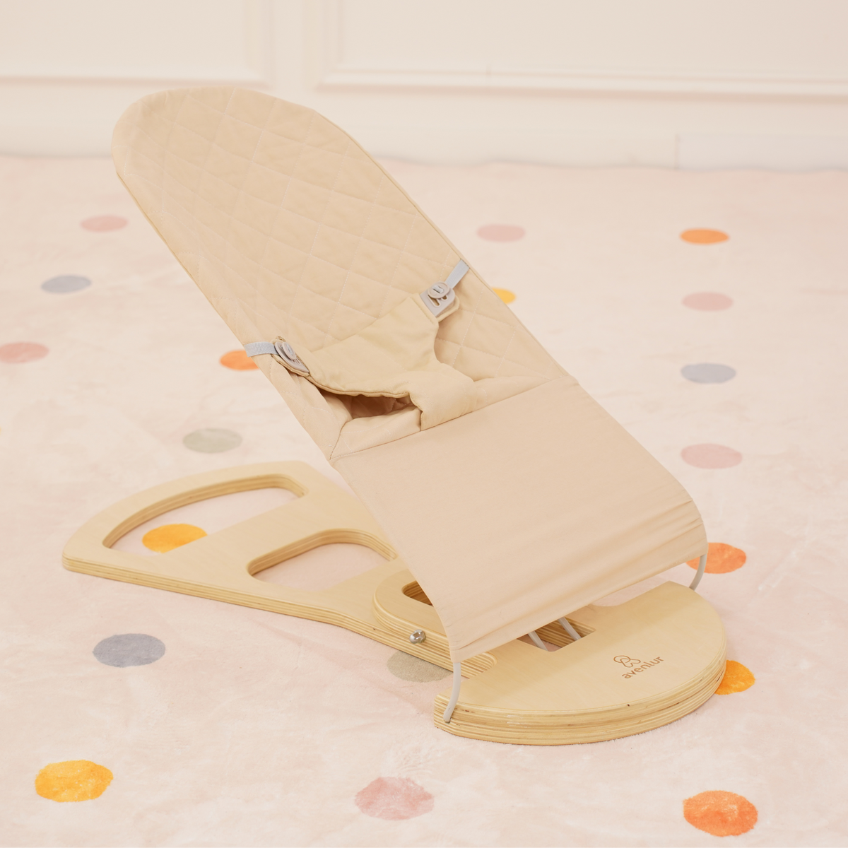 Close up of the solid wood frame on the Avenlur Fir Montessori baby bouncer