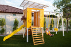 Avenlur Forest modern playset in a backyard