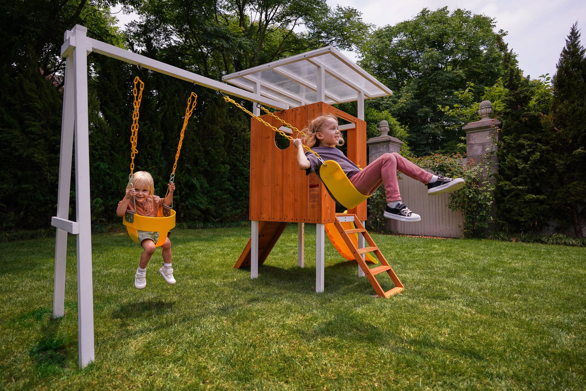 Child on the belt swing of the Avenlur Forest Small swing set