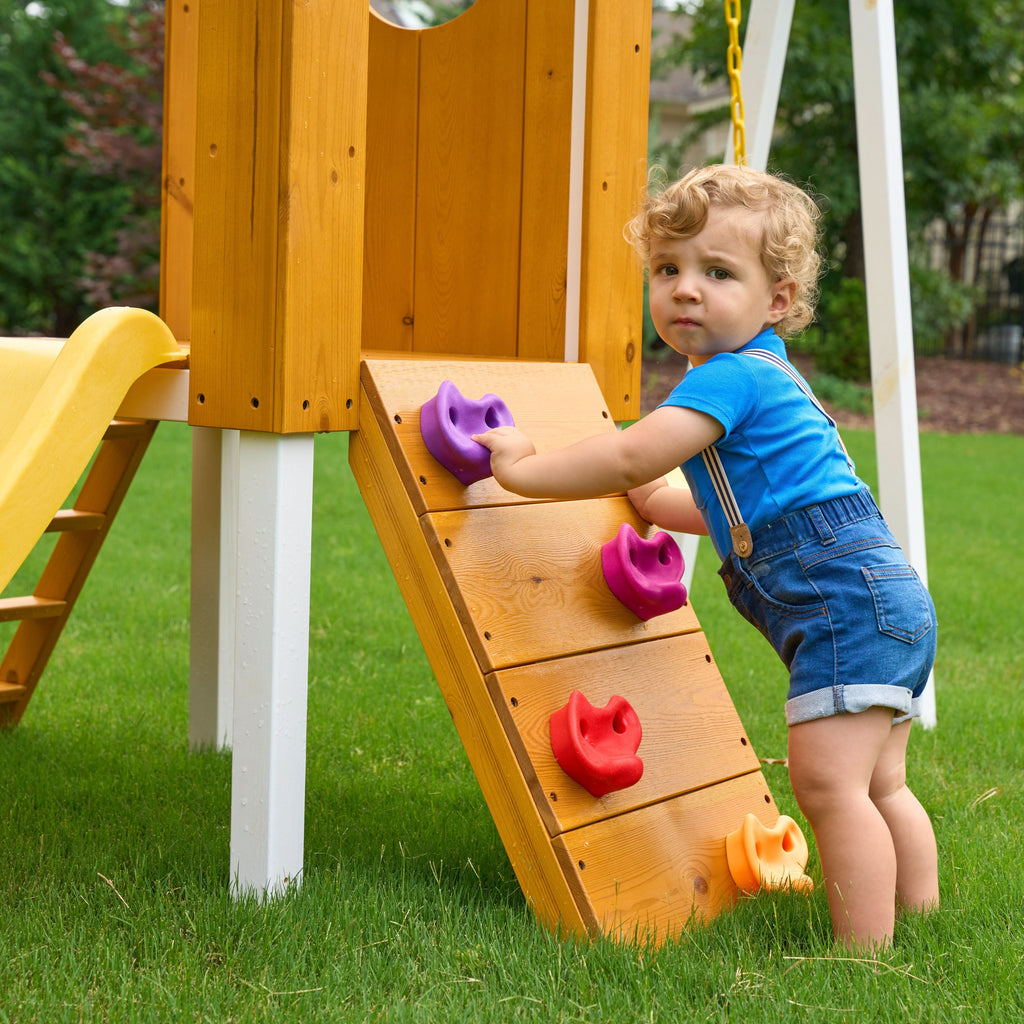 Kids playing on the Avenlur Forest Small swing set