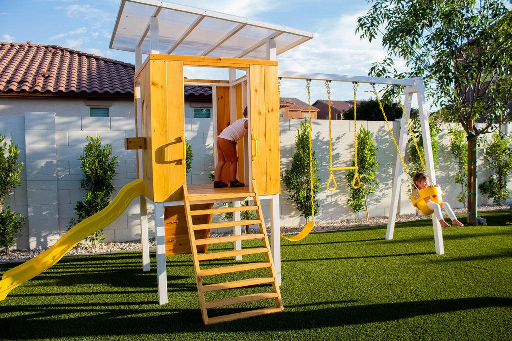 Avenlur Forest wooden playset with slide in the yard