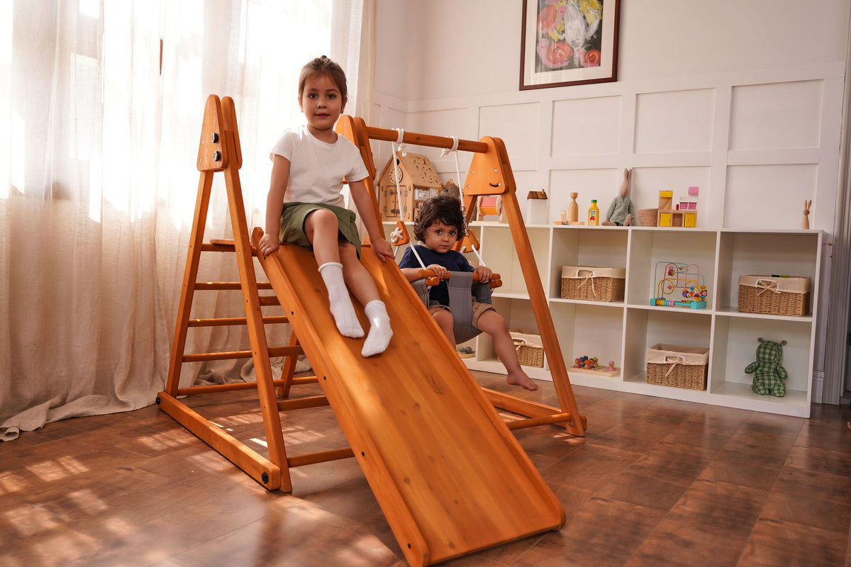 Avenlur Juniper outdoor playset for toddlers on a sunny patio