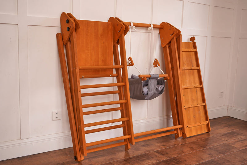 Toddler swinging on the Avenlur Juniper toddler outdoor swing
