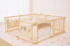 Baby pulling up on the Avenlur playpen safety mirror bar