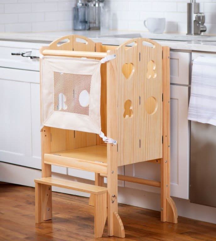 Avenlur Plum toddler step stool used at the bathroom sink