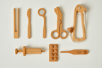 Kids playing doctor with the Avenlur wooden medical set