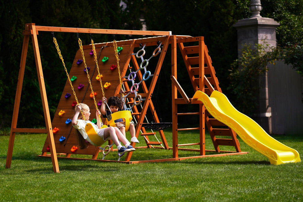 Avenlur Sycamore Jumbo outdoor wooden climbing frame with rock wall and wave slide
