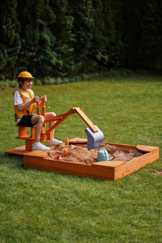 Child dumping sand with the Blippi excavator arm