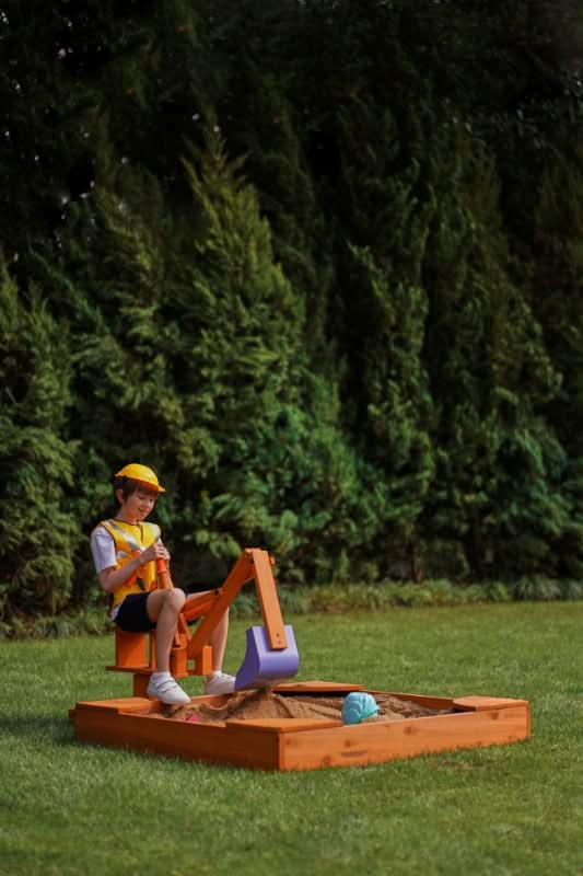 Blippi excavator outdoor toy on the lawn