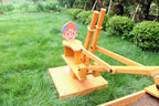 Kid riding the Blippi ride-on excavator