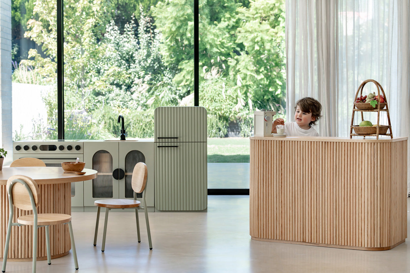 Sage Fluted play fridge in a bright, modern playroom kitchen
