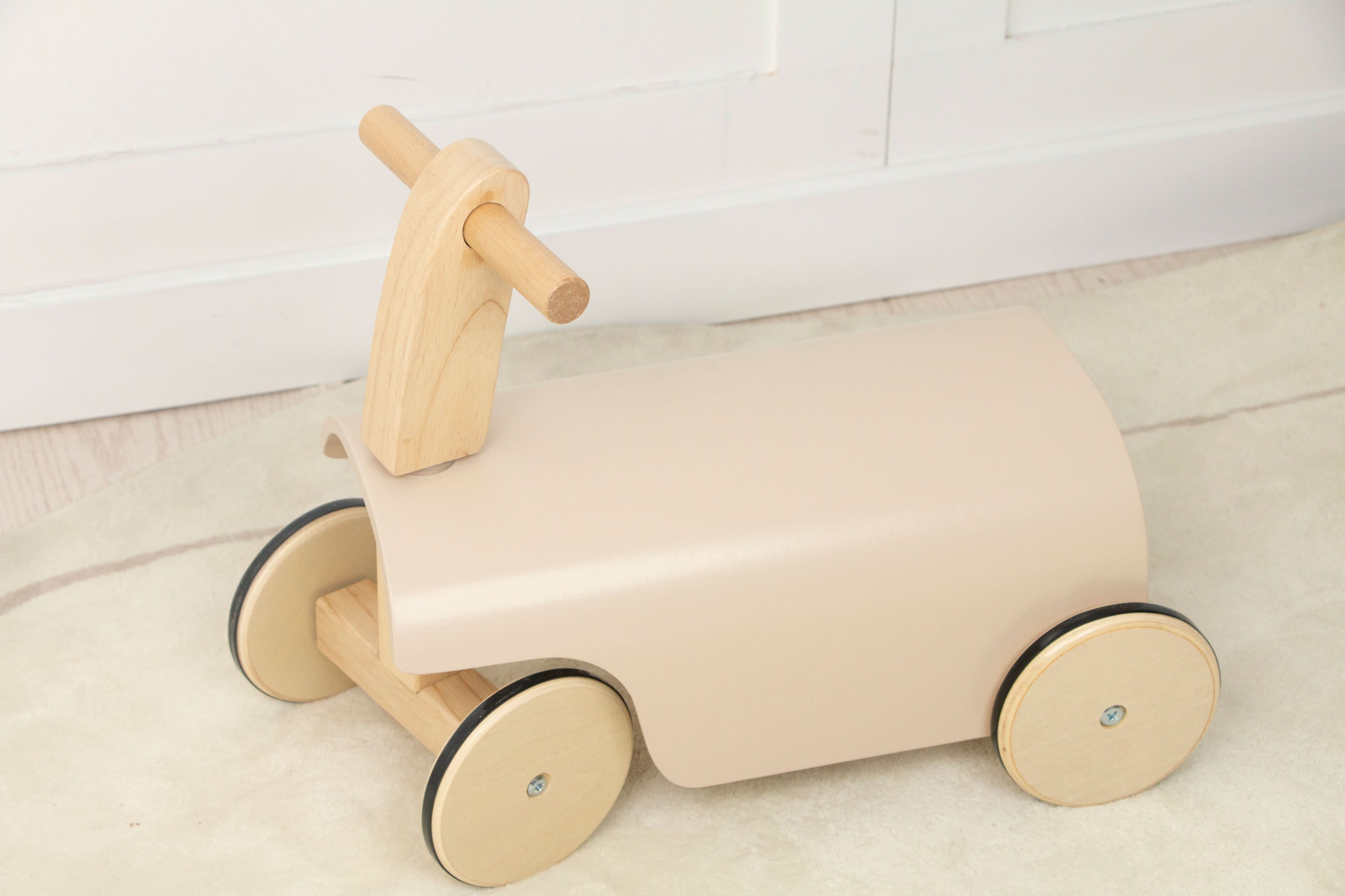 Kids Toddler Wooden Ride-On Toy with Wheels and Walker.