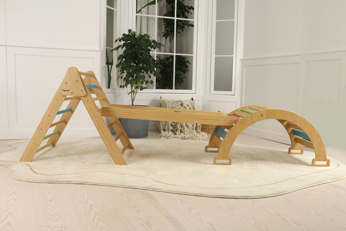 Toddler sliding down the Avenlur Hazel climbing ramp