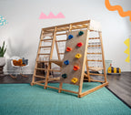 Avenlur Magnolia full color wooden indoor jungle gym with monkey bars, climbing wall, slide and swing