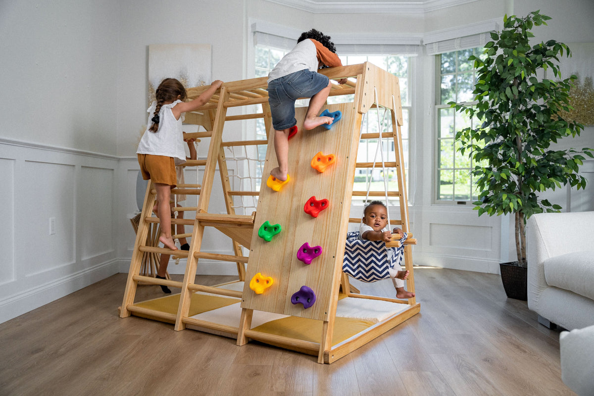 Avenlur Magnolia wooden indoor jungle gym with rock climbing wall, monkey bars and slide for toddlers and kids