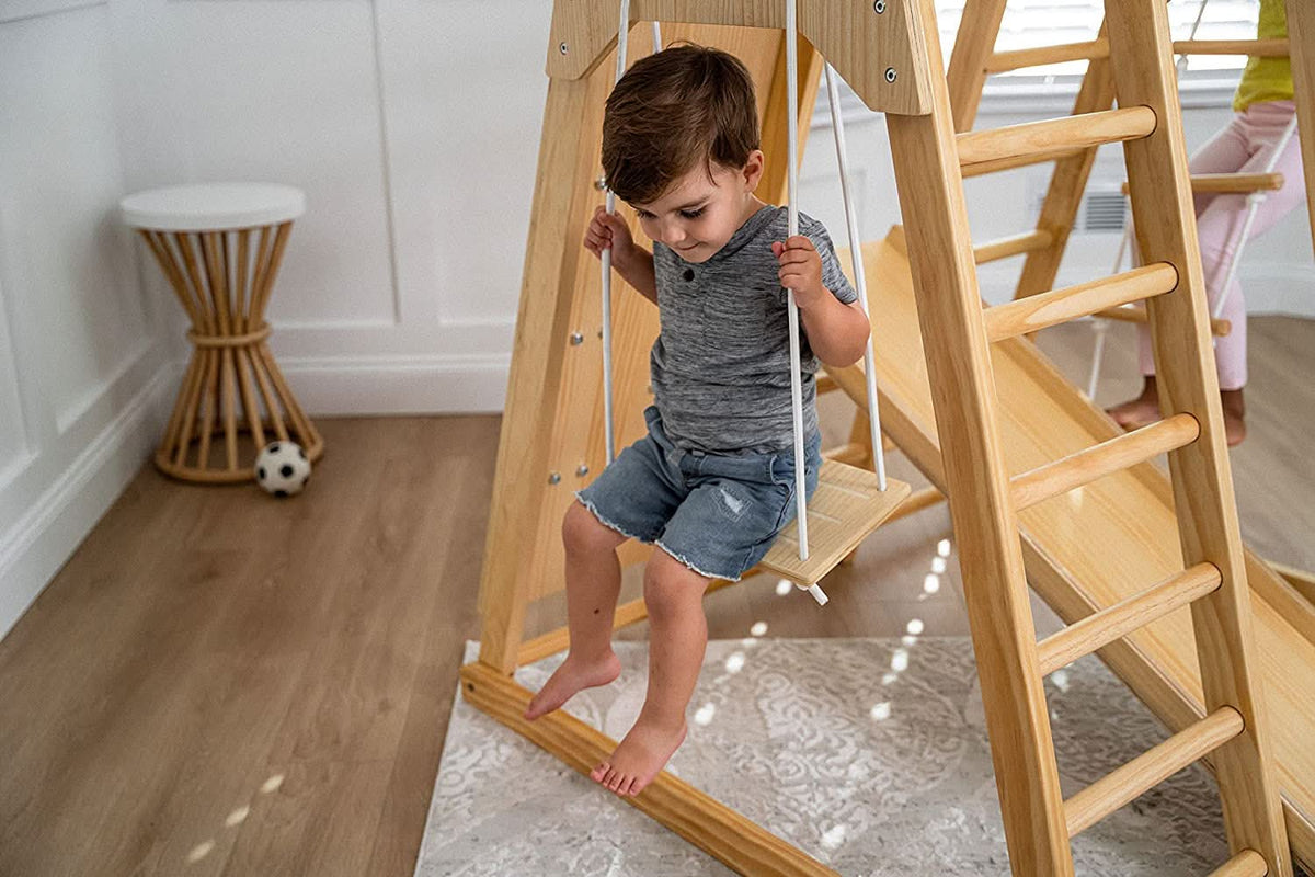 Avenlur Magnolia wooden indoor jungle gym with monkey bars, rock wall and slide