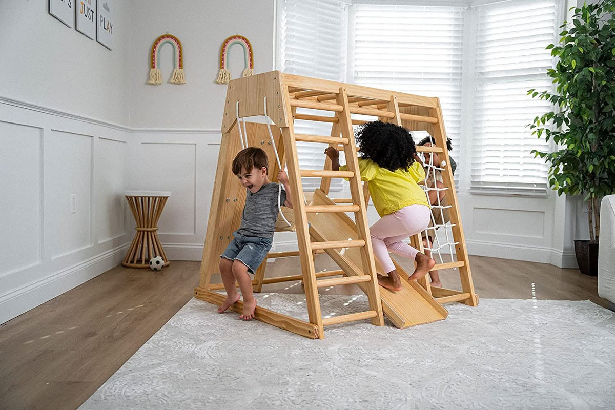 Avenlur Magnolia indoor wooden jungle gym with rope ladder, rock wall and monkey bars