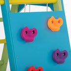Close-up of the colorful rock climbing wall on the Avenlur Magnolia wooden jungle gym