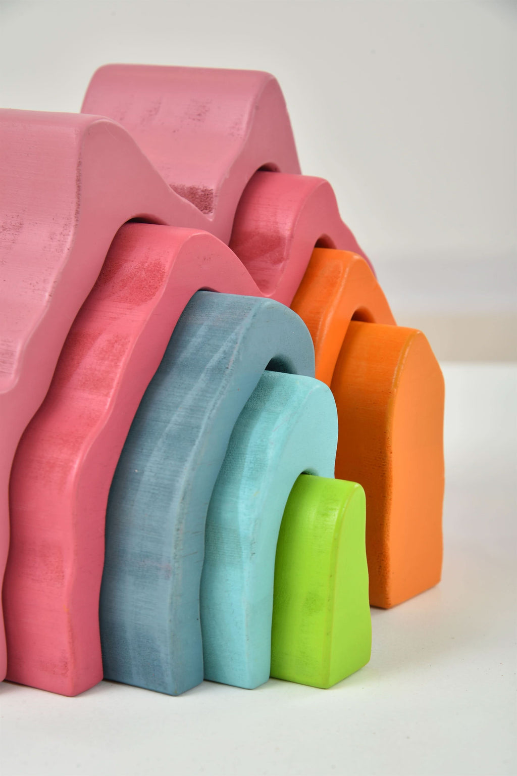 Avenlur rainbow stacker pieces laid out side by side