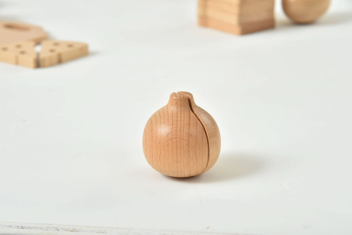 Close up of Avenlur wooden play food pieces